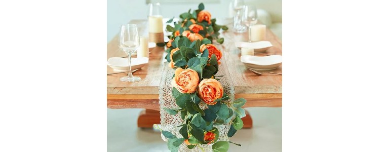 An artificial peony vine decorating a dining table