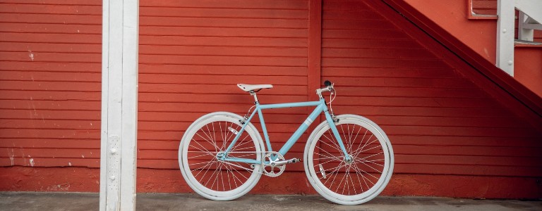 Blue and white bicycle