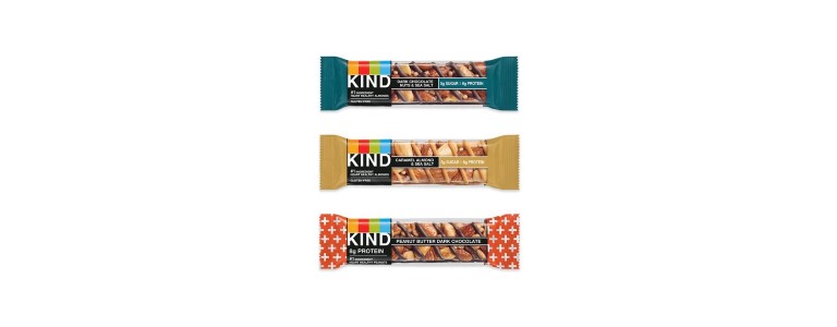 Three different-flavored KIND nut bars.