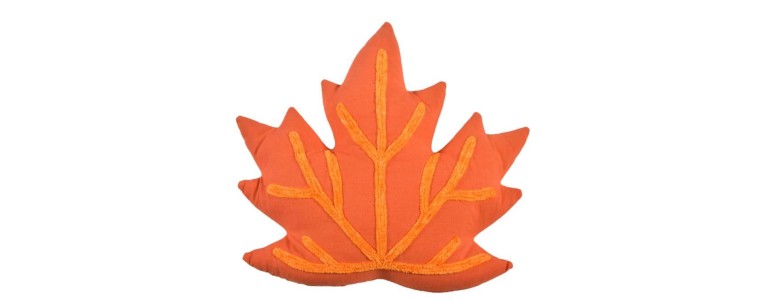 An orange leaf-shaped pillow
