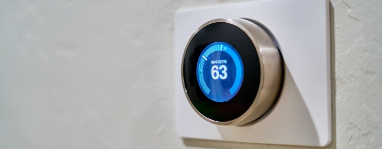 Smart thermostat on the wall