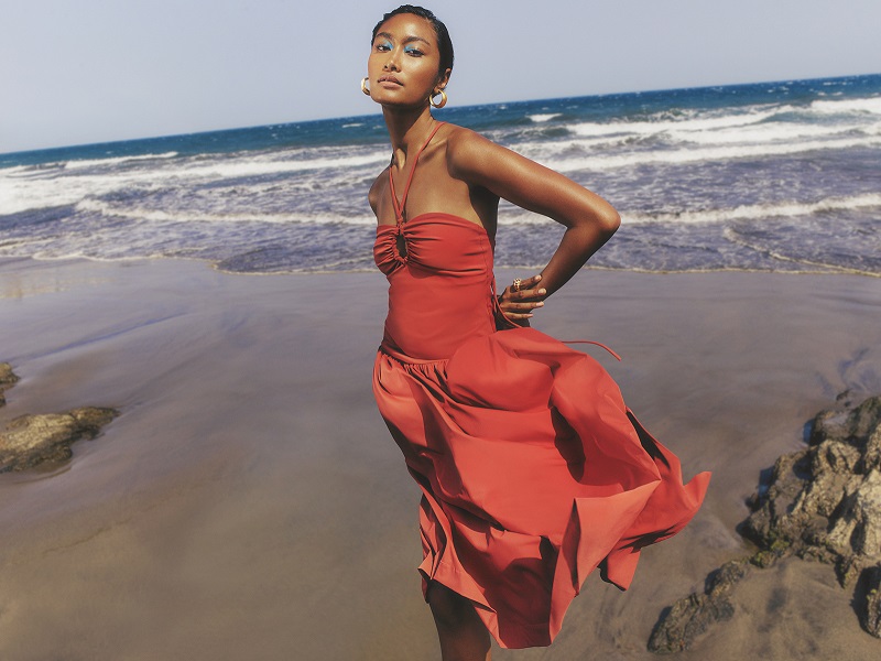 Woman wearing Outnet dress on beach